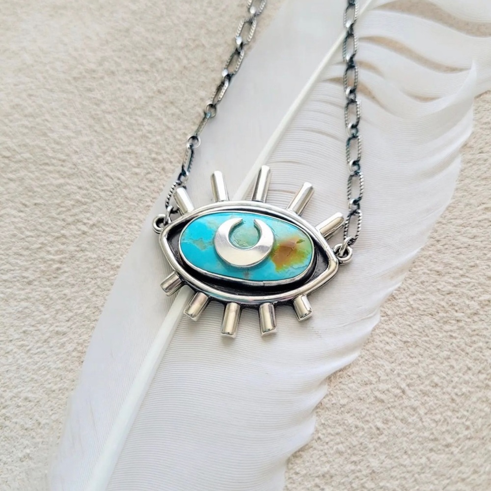 Genuine turquoise Evil Eye Sterling Silver pendant